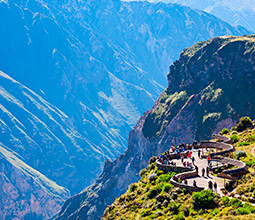 Tourists appreciating the Colca Valley from a viewpoint